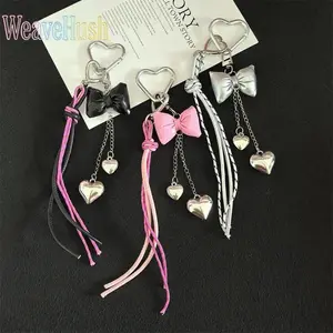 Leather Bow Bag Charm, Hand-Woven Nylon Rope Heart Phone Pendant, Y2K Single-Clasp Tassel Keychain. Trendy Y2K style, lightweight and delicate, multi-purpose decorative accessory. Versatile for bags, keys, mobile phones and daily home decoration, stylish