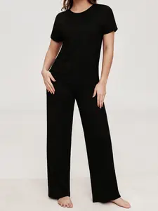 Minimalist basic women's 2-piece set of solid black short sleeved shorts, soft and comfortable, skin friendly, smooth round neck design, elastic waistband, suitable for all seasons, women's home clothing