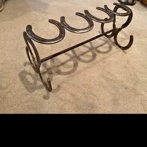 Horse shoe boot rack