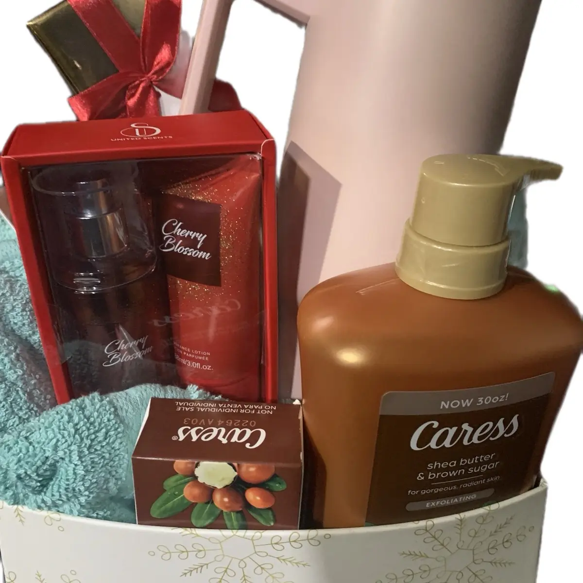 Caress body wash set and a towel set, cup, wash ball
