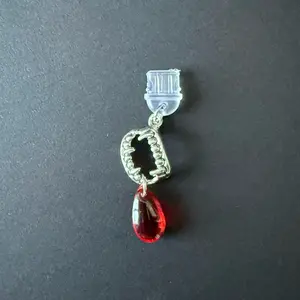 USBC dust plug charm - vampire teeth and droplet