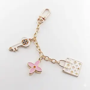 Gold Tone 3 Charm Key Flower 6 Inch Bag Charm
