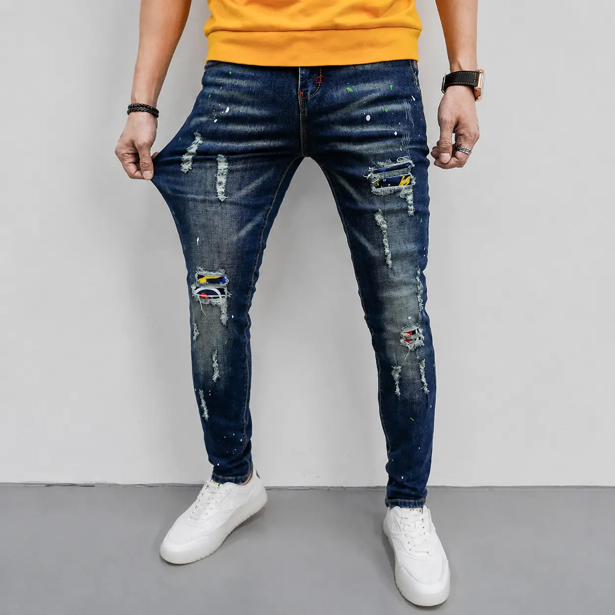 Men’s dark wash stretch skinny jeans streetwear with paint splatter