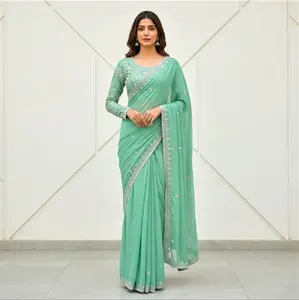 Sequined and pearl work saree and blouse set.