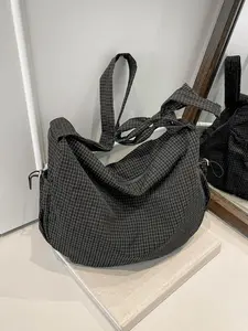 Relaxing atmosphere plaid shoulder bag, retro casual versatile large capacity Commuter crossbody bag, with side pocket drawstring design, can accommodate files, phones, suitable for shopping, parties, commuting