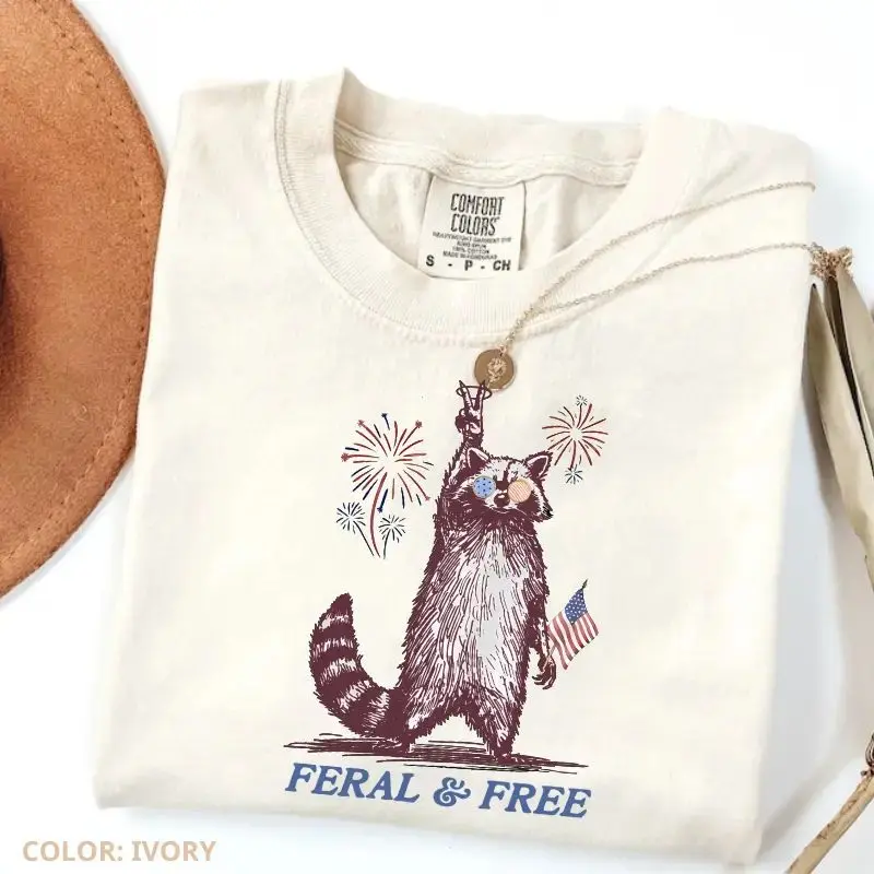 Comfort Colors Vintage Feral and Free T-shirt, Funny USA Raccoon Shirt, 4th Of July Womenswear