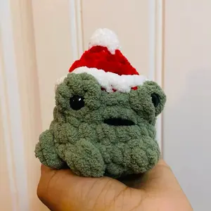Crochet Grumpy Pocket Frog with Festive Santa Hat Adorable Handmade Plush Toy for Kids