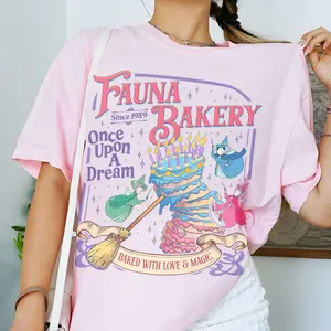 [Sale off up to 50%] Fauna Bakery Baked With Love And Magic Shirt, Sleeping Princess Tshirt, Fairy Godmother Tee, Theme Park Family Shirts, Graphic Streetwear T-shirt
