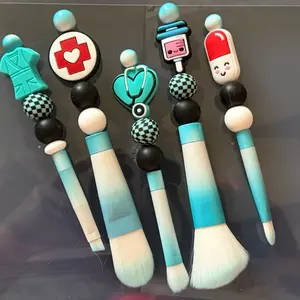 Custom Makeup Brushes with Unique Character Handles for Enhanced Application
