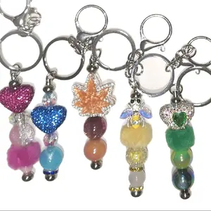 Customized Bling Keychains with Heart and Leaf Charms made live with the customer