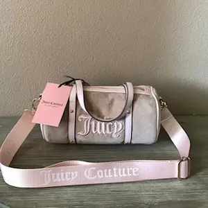 Juicy couture crossbody bag , queen of everythingeverything barrel bag