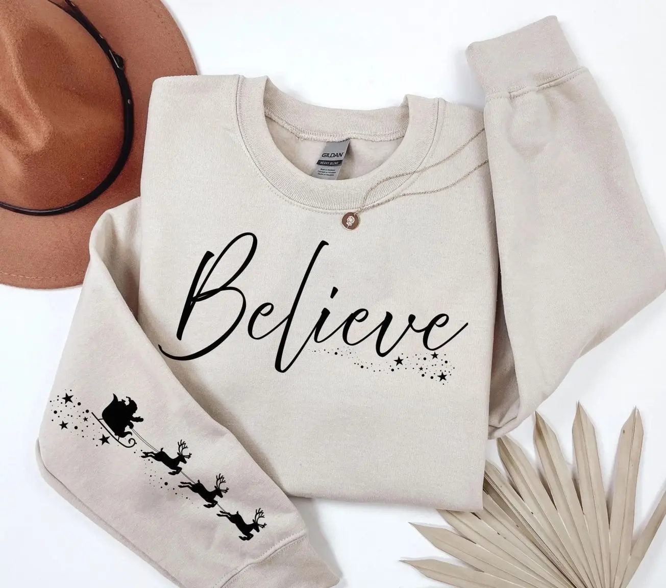 Believe Christmas Sweatshirt, Holiday Santa Magic on the Sleeve Sweatshirt, Cute Festive Xmas Spirit Crewneck, Santa Claus Believe Graphic Pullover, Merry Christmas Holiday Outfit, Cozy Winter Season Apparel, Cute Xmas Gift for Women & Men