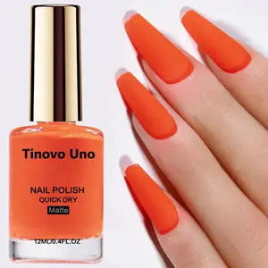 Tinovo Uno Matte Frosted Orange Nail Polish, Nail Care, delivers a velvety matte finish. Quick-drying and long-lasting, it air-dries naturally without needing a fan. Alcohol-free formula.