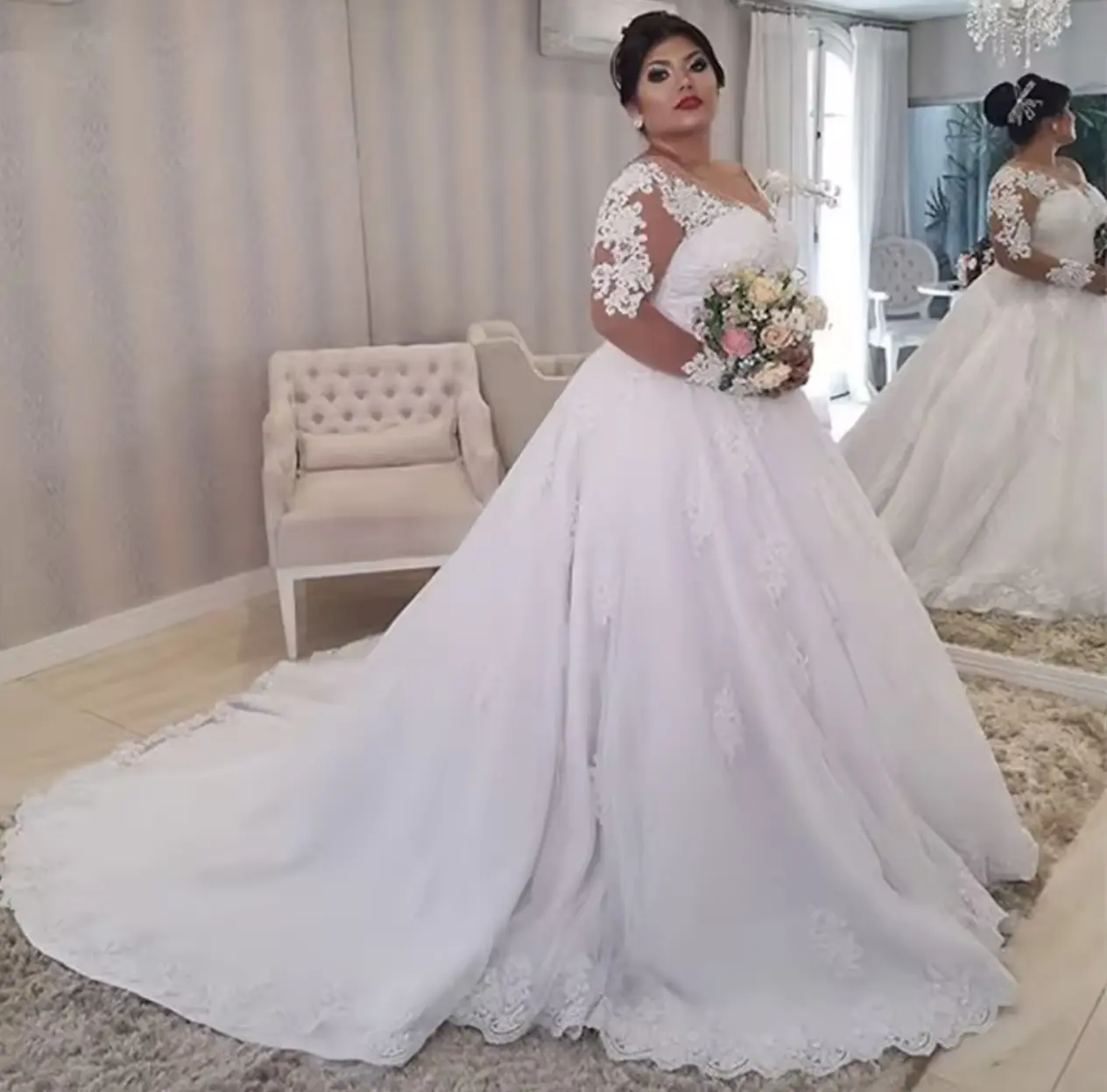 Long sleeved Laced wedding gown