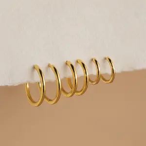 Mini Bold Hoops by Caitlyn Minimalist - Stacking Hoop Earrings in Gold & Silver - Lightweight Dainty Earrings - Best Friend Gift
