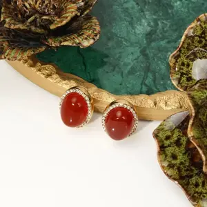 Pre-owned minimalist oval stud earrings featuring red glazed ceramic inlay—stylish and versatile ear jewelry