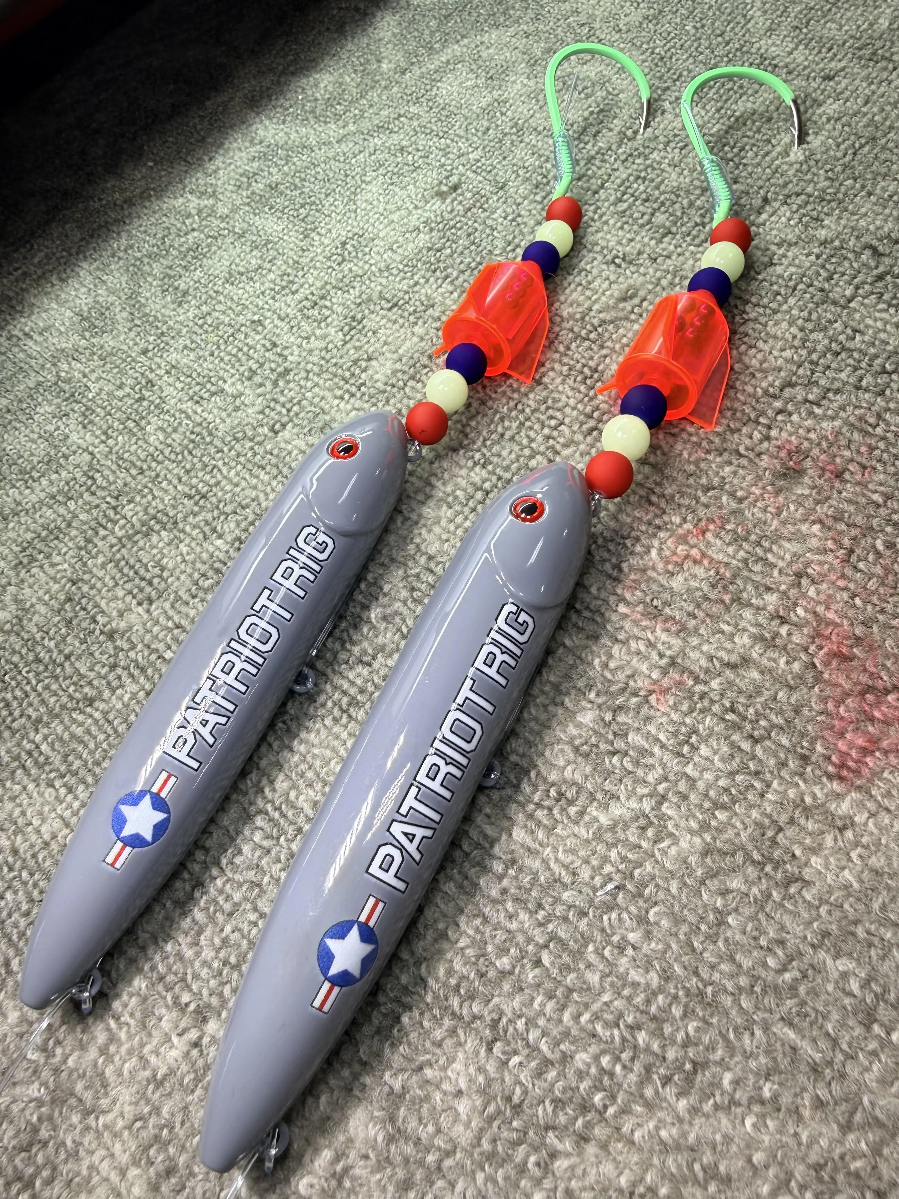 Patriot Rigs (13cm) 2 Pack:  Pre-Tied on 10/0 green glow hooks, rocket rattle, and 100 pound smoke blue mono leader line