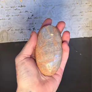 Orange moonstone palm stone