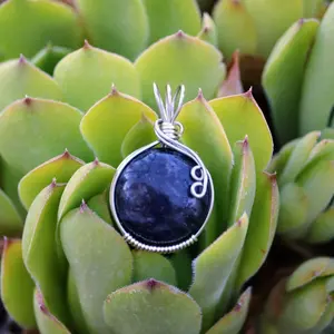 Silver Wire Wrapped Blue Flash Larvikite Crystal Pendant