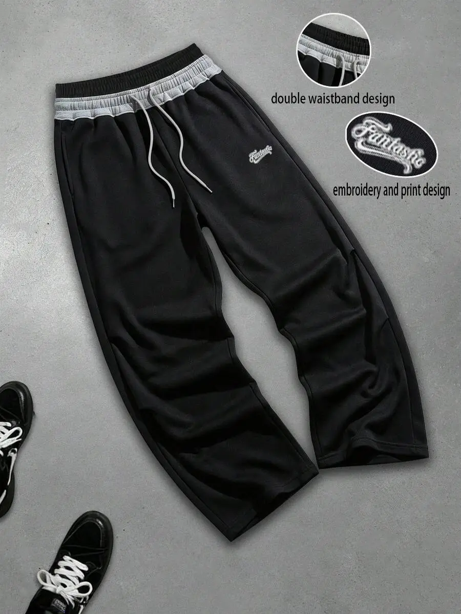 Unisex oversized Y2K street casual athletic pants. Men’s faux two-piece jogger sweatpants with dual belts and embroidered logo, featuring an elastic waistband and drawstring design—perfect for streetwear and weekend activities, suitable for various venues
