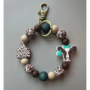 Turquoise Tooled Leather Brown Cow Wristlet