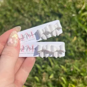 Pearly White Bow Stud Earrings | Polymer Clay | 0.5 Inch | Bridal Gift | Bridesmaids Gift | Bridal Shower | Wedding Earrings by Magik Makes