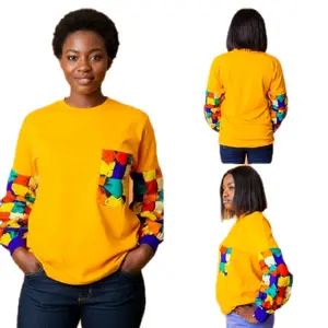 Vibrant Yellow Sweatshirt with Colorful Patchwork Sleeves and Pocket for Stylish Comfort