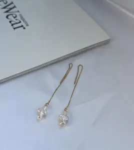 E26-The ‘Sanctuary’ Linear Pearl Threaders — A Sculptural Cross of Luminous Freshwater Pearl. pearl cross earrings, cross threader earrings, pearl drop earrings, long pearl earrings, freshwater pearls, quiet luxury, old money aesthetic