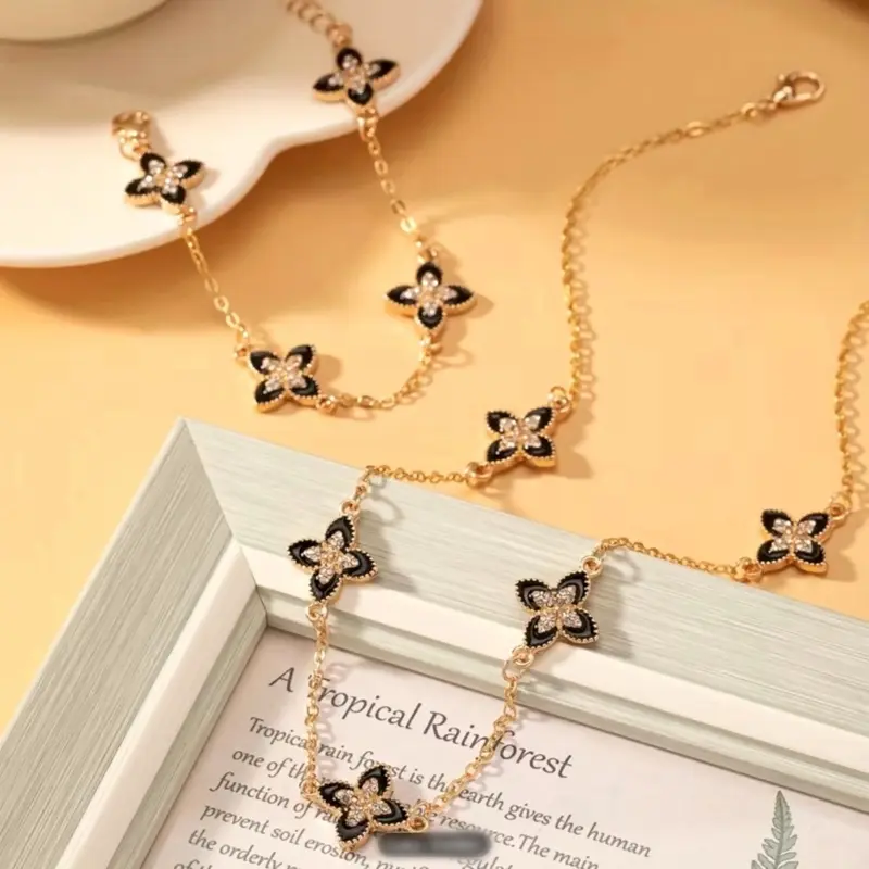 Gold Tone Lucky Four Leaf Clover Jewelry Set 2 Piece Matching Necklace and Bracelet Minimalist Y2K Classic Stainless Steel Charm Set Adjustable Chain for Women Daily Wear Gift Set Black Clover Design