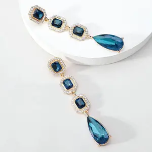 European and American fashion-inspired, premium-designed long-drop-shaped crystal earrings with a dazzling shine. Elegant, versatile, and perfect for cross-border purchases.