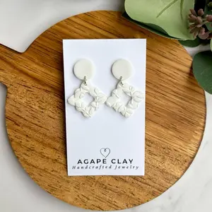 White Scalloped Dangle Earrings with Floral Imprint and Nickel-Free Metal Fixings