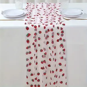 Strawberry Mesh Tablecloth – 29.53 x 70.87 inches. Featuring a delicate white background adorned with red strawberry patterns, this tablecloth is perfect for weddings, birthdays, parties, as well as strawberry-themed celebrations and supplies.