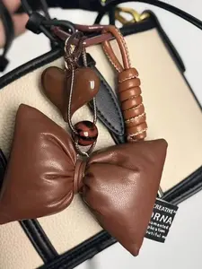 Brown Miu Series Bag Charm Textured Leather Stylish HighEnd Handmade Autumn Winter Brown Bag Pendant withBow and Heart Accents Fashion Bag Charms Accessories For Bags, Purse Charm