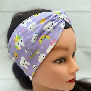 Purple Unicorn dental twist headband with floss and toothpaste