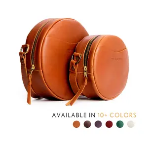 Portland Leather Circle Crossbody - Unique Shape Carry - Leather Round Bag, Adjustable Strap, Compact Storage Portland Leather Circle Crossbody - Unique Shape Carry - Leather Round Bag, Adjustable Strap, Compact Storage