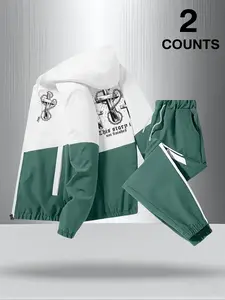 Men's two-piece sports set: hooded jacket and drawstring sweatpants featuring Gothic crosses and artistic prints. Avant-garde street style outfit for dark fashion. Comfortable sports design with striking dark aesthetics. Streetwear tracksuit set