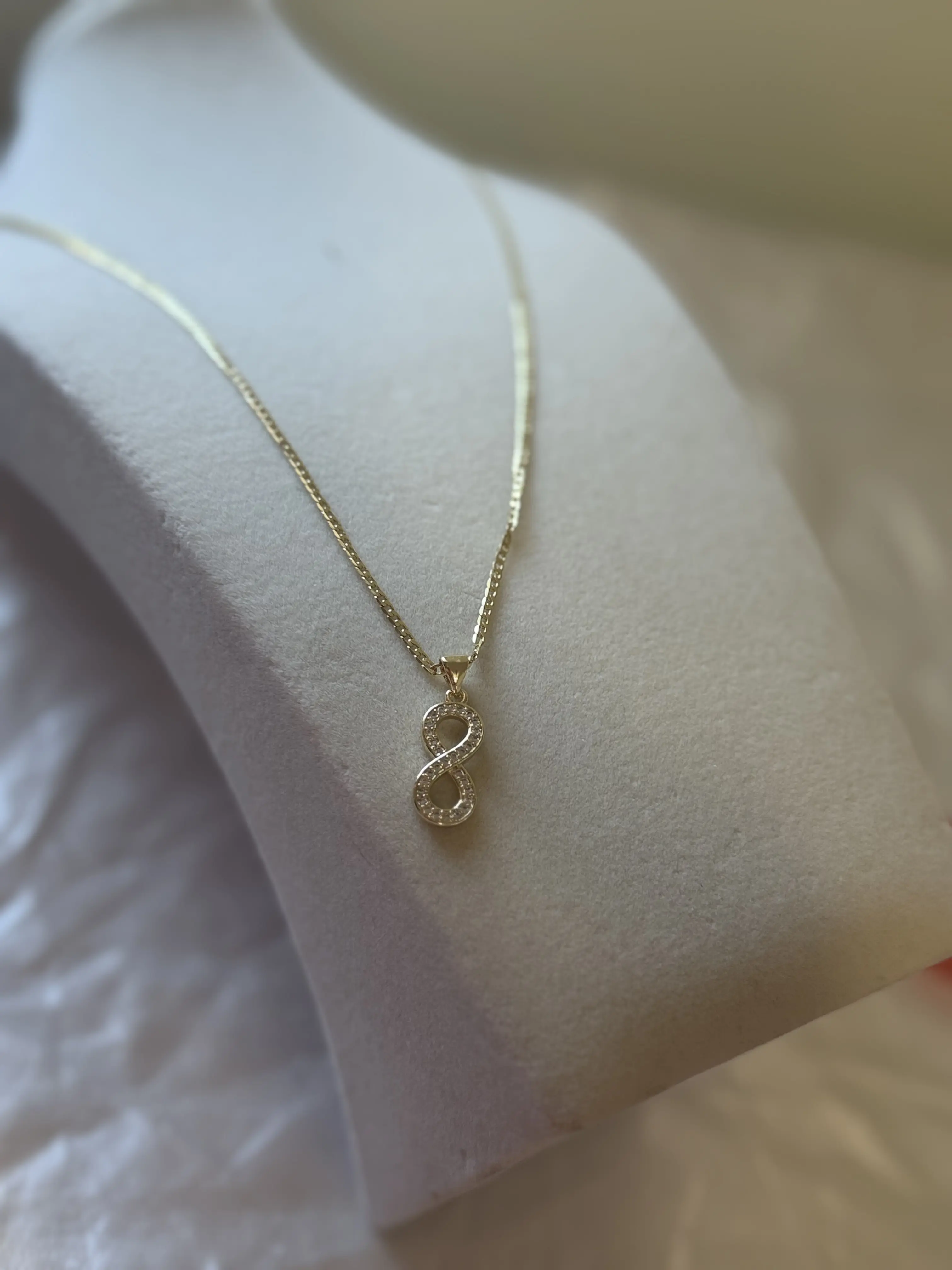 Gold Infinity Necklace with Delicate Chain and Elegant Design
