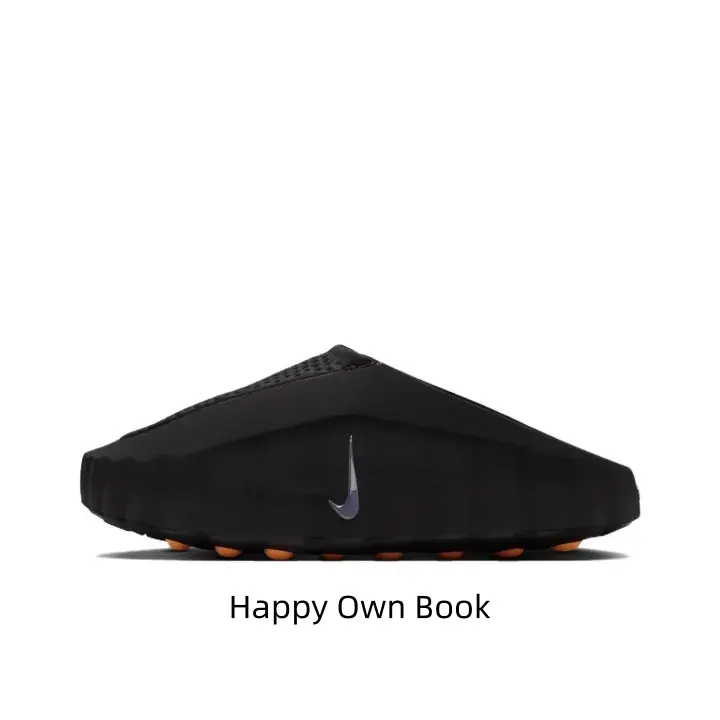 Solid matte full-black two-tone slide clogs, soft rugged molded foam construction, vivid orange circular outsole eye-catching accents match dark casual, athletic & minimalist streetwear fits