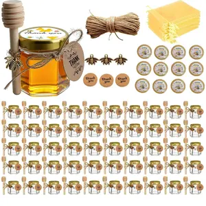 50-Pack Transparent 1.5oz Glass Hexagon Mini Honey Jars Set with Gold Lids, Wooden Dippers, Bee Charms, Gift Bags, Tags, Twine for Baby Shower, Wedding Party Favors