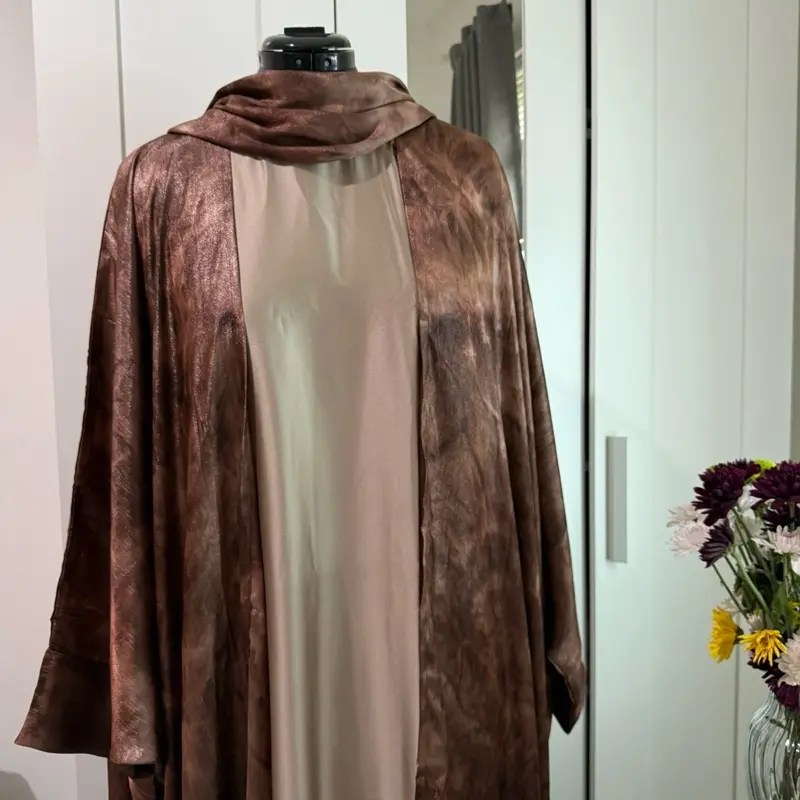AlGhazal Abaya - Brown and Beige Color Scheme Clothing Item as Shown in the Image