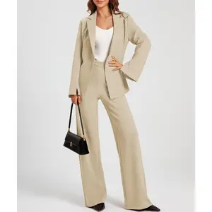 Women’s two-piece suit set featuring an asymmetrical business-casual jacket and button-up wide-leg trousers; a fitted, fashionable, and elegant ensemble.