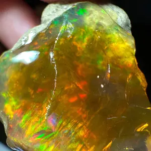 Ethiopian Water Opal Specimen with yellow base color and firework like play of color