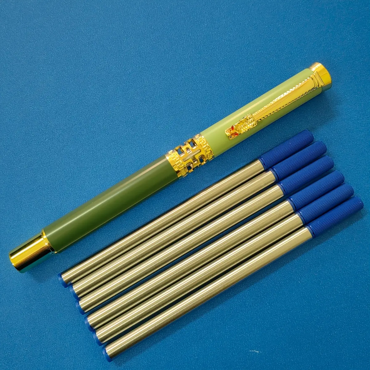 1 pc green pen + 6 pcs blue refills