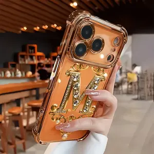 TPU Full-Coverage Lens Protective Phone Case - Luxury Diamond & Gold "M" Design, Shockproof, Non-Slip Casing, Multi-Model Compatible with iPhone 17,16,15,14,13,12,11,XS,X Series, Handheld Phone Accessories, Ideal Gift