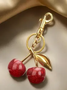 The charm of bag accessories with cherry design. Fashionable keychains for wallets are fashionable, versatile and exquisite for girls. They are charming as birthday gifts, wallet accessories and delicate keychain ornaments.
