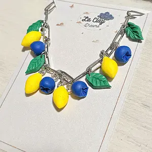 Handmade Polymer Clay Bracelet with Lemon and Berry Charms on a Chain Link Design. YOU-CLAIM. TIKTOKLIVE