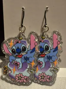 island blue alien floral plastic dangly earrings