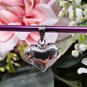 corazon abombado plata.925