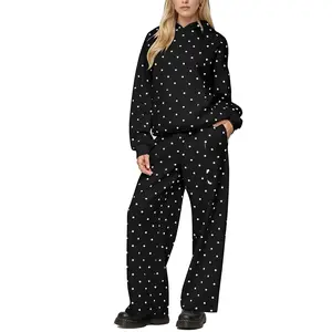 Women’s polka dot set featuring a long-sleeve oversized hoodie top and wide-leg sweatpants; casual tracksuit outfit for girls with a preppy style