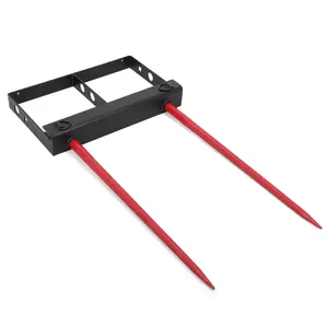 Move 4000-pound bales safely with this dual-spike hay spear attachment. The 39-inch spears fit most skid steers and tractor buckets via a quick-attach system. Link in bio.